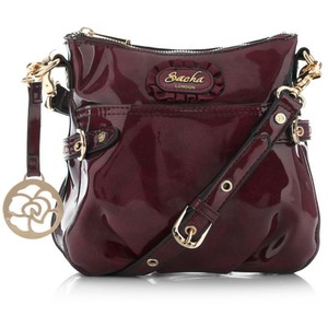 red patent rosette sacha london cross body bag